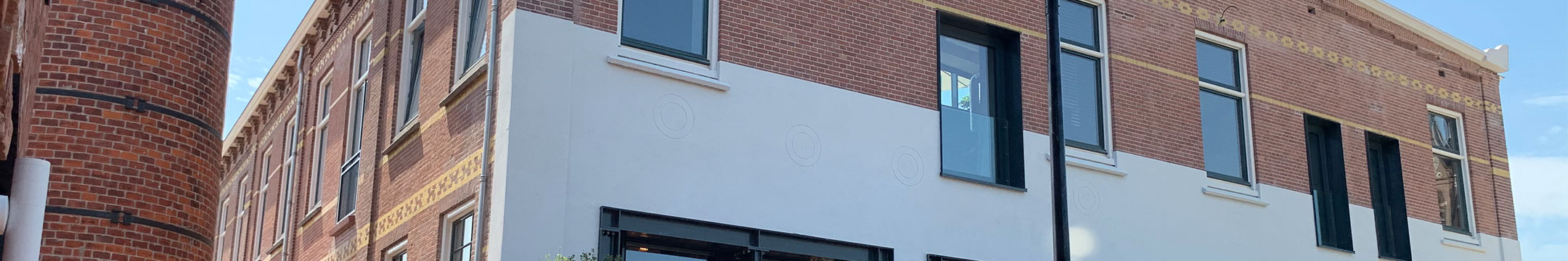 Gevel monument de Wasserij in Woerden transformatie header Gevel monument de Wasserij in Woerden transformatie header